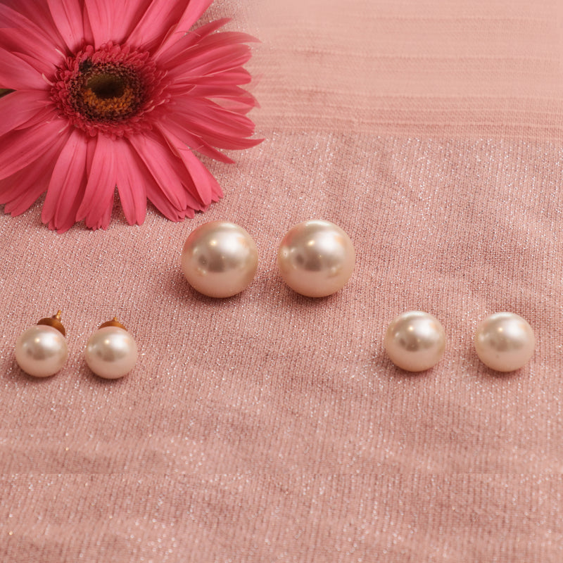 Oversized pearl studs